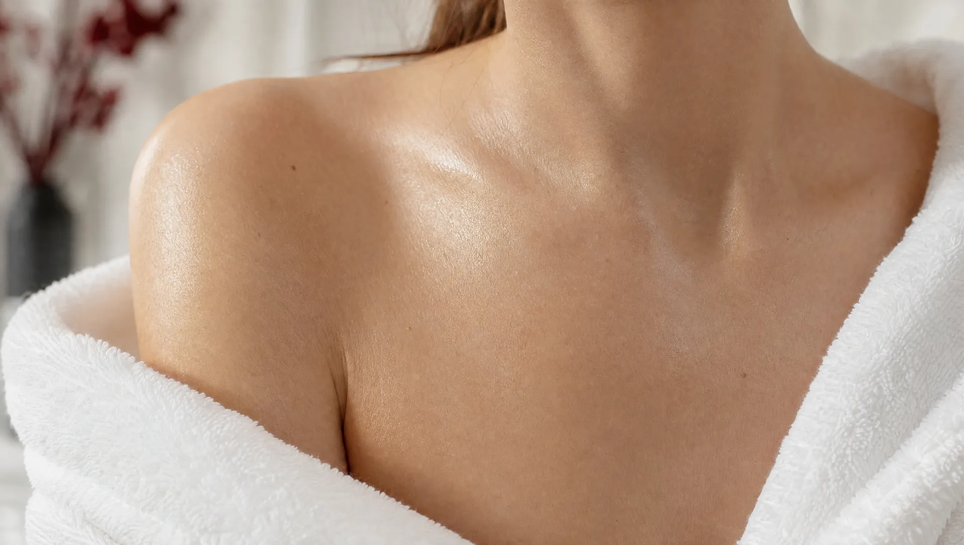 Calm, natural skin across the collarbone — the considered, area-by-area focus behind fat-dissolving treatment at Activate Beauty in Toronto.
